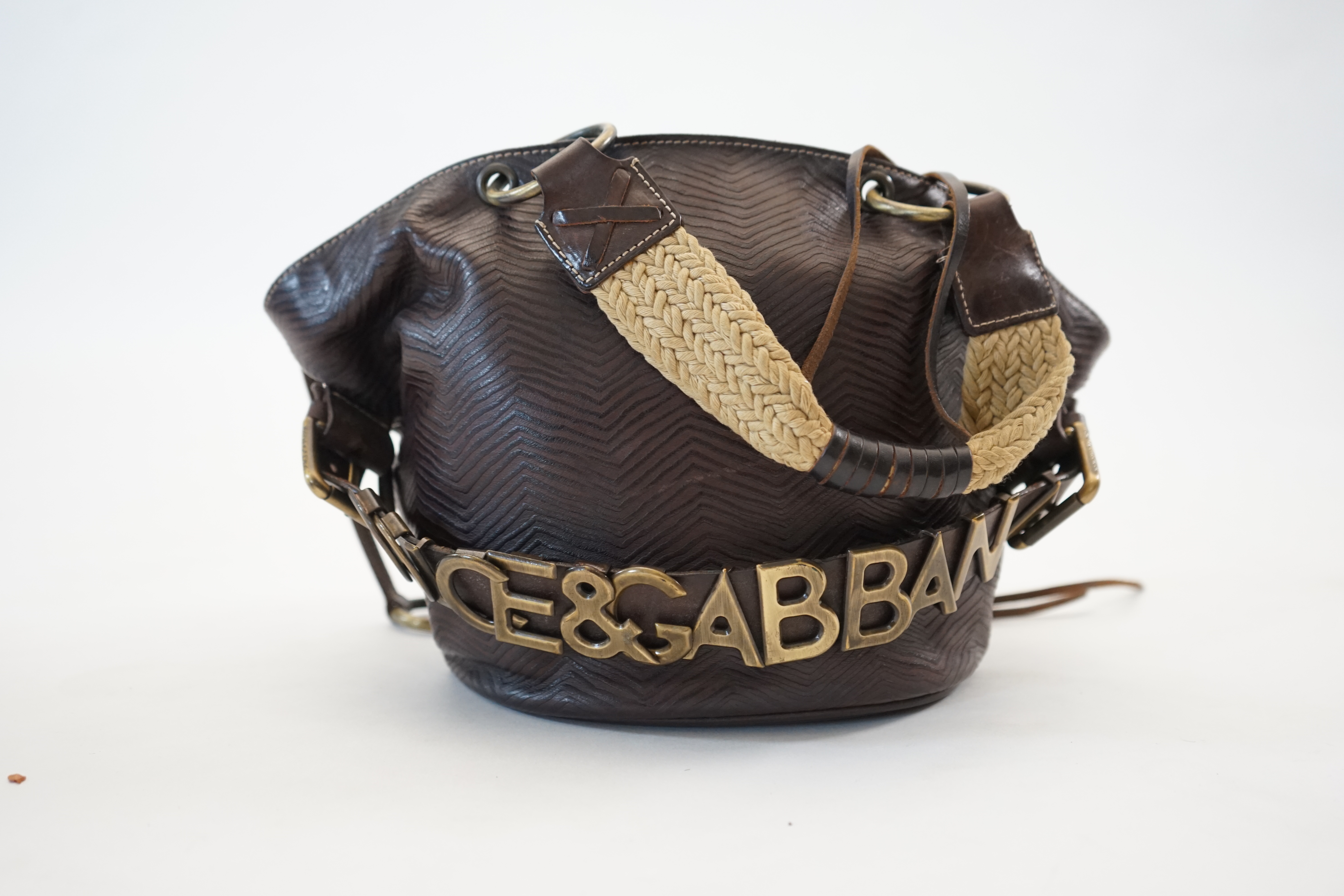 A Dolce & Gabbana brown and black leather bucket bag, width (max) 34cm, depth 14cm, height 20cm